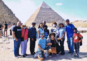 Group of people in front of the Pyramids